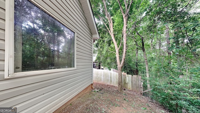 700 Patriots Point St, Locust Grove, GA 30248 - view of home's exterior with fence