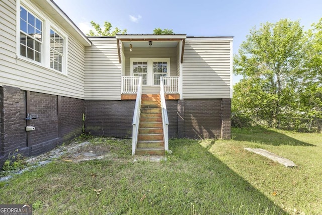 611 Monroe St, Macon, GA 31201 - back of property with a lawn and stairway