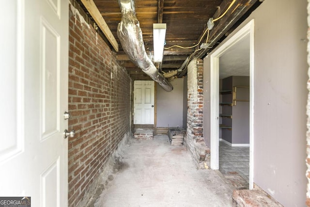 611 Monroe St, Macon, GA 31201 - unfinished below grade area featuring brick wall