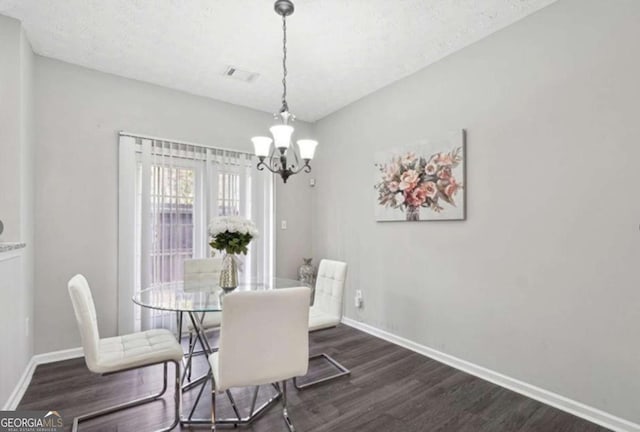 20 Pine Canyon Dr SW Unit 26, Atlanta, GA 30331 - dining room featuring dark wood-style floors and a chandelier
