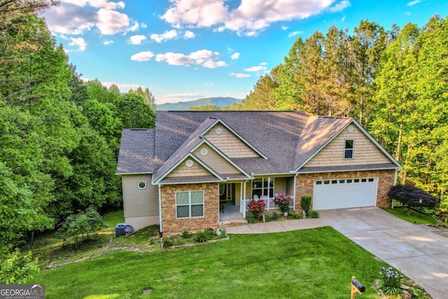 90 Loftis Mountain Way, Blairsville, GA 30512 - craftsman house with stone siding, concrete driveway, a porch, a garage, and a front lawn
