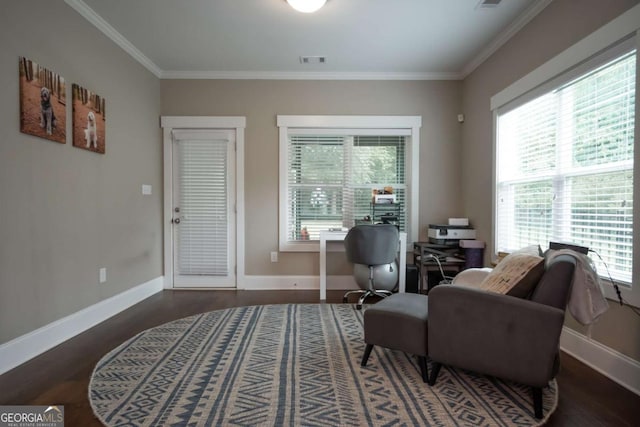 sitting room with crown molding, baseboards, wood finished floors, and a desk