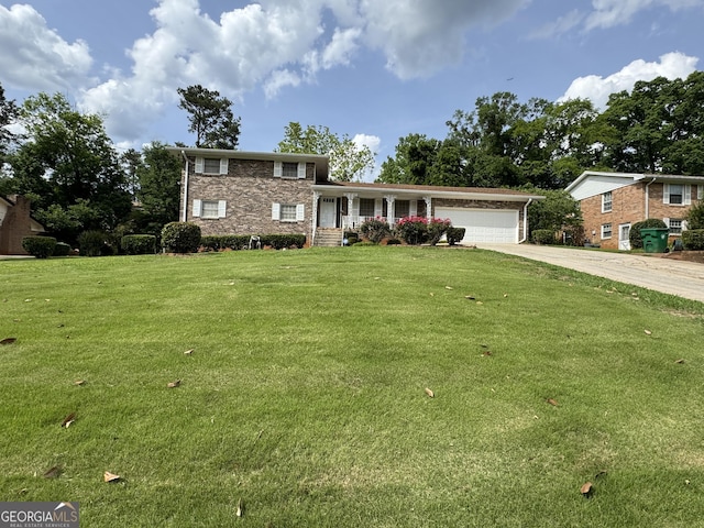 3662 Greentree Farms Dr, Decatur, GA 30034 - tri-level home with a garage, driveway, a front yard, and brick siding