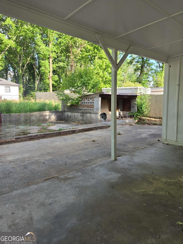 6136 Holiday Blvd, Forest Park, GA 30297 - view of patio featuring fence