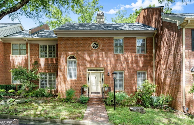 40 Ivy Chase NE, Atlanta, GA 30342 - view of front of house featuring a chimney and brick siding