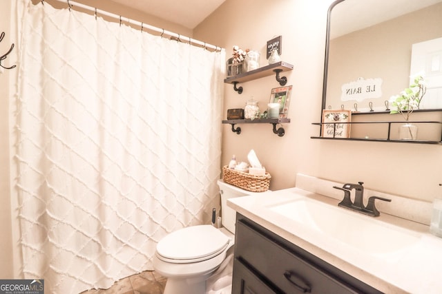 full bathroom with toilet, vanity, and a shower with shower curtain