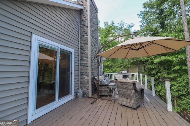 deck featuring an outdoor living space
