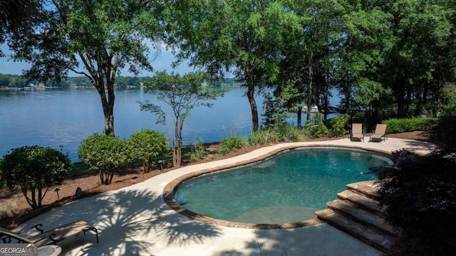 1221 Cosby Cir, Greensboro, GA 30642 - outdoor pool featuring a patio and a water view