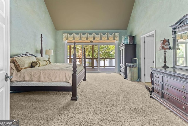 1221 Cosby Cir, Greensboro, GA 30642 - carpeted bedroom with high vaulted ceiling, access to outside, and a water view