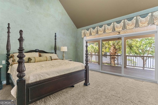 1221 Cosby Cir, Greensboro, GA 30642 - bedroom featuring carpet floors, access to outside, high vaulted ceiling, and a water view