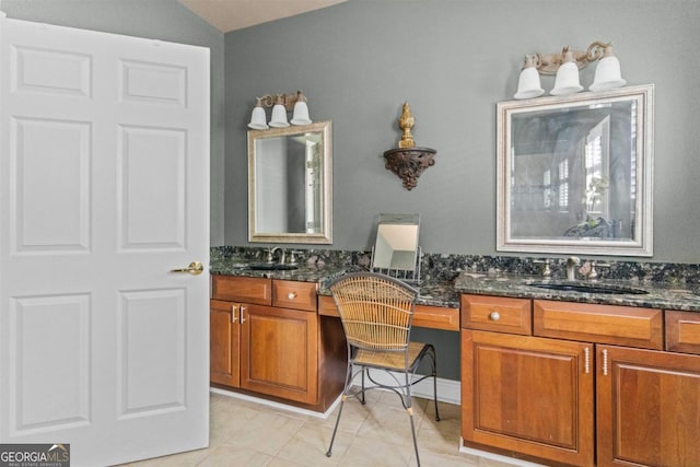 1221 Cosby Cir, Greensboro, GA 30642 - bathroom with lofted ceiling, vanity, and tile patterned flooring