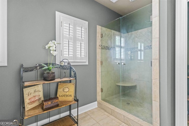 1221 Cosby Cir, Greensboro, GA 30642 - bathroom featuring a stall shower, tile patterned floors, and baseboards