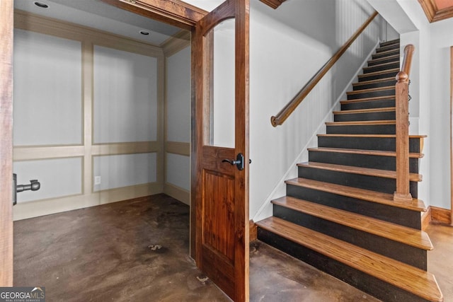 1221 Cosby Cir, Greensboro, GA 30642 - staircase featuring concrete floors and ornamental molding