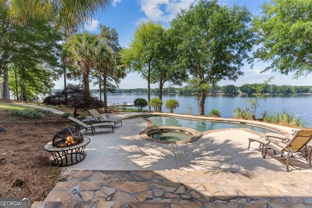 1221 Cosby Cir, Greensboro, GA 30642 - outdoor pool featuring a fire pit, a patio, a water view, and an in-ground hot tub