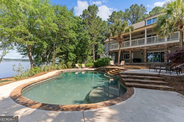 1221 Cosby Cir, Greensboro, GA 30642 - swimming pool featuring ceiling fan, a patio area, and a water view