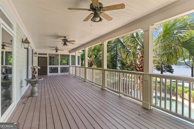 1221 Cosby Cir, Greensboro, GA 30642 - wooden terrace featuring a ceiling fan, an outdoor pool, and a water view