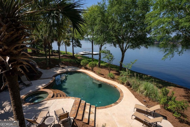 1221 Cosby Cir, Greensboro, GA 30642 - view of pool featuring a patio area, a water view, and a pool with connected hot tub