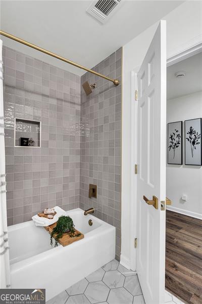 529 Greystone Trl, Marietta, GA 30068 - full bath with shower / washtub combination and tile patterned floors
