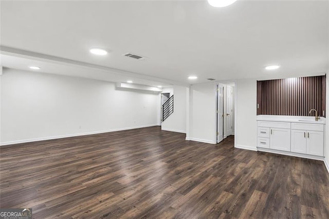 529 Greystone Trl, Marietta, GA 30068 - finished below grade area with dark wood finished floors, recessed lighting, and baseboards