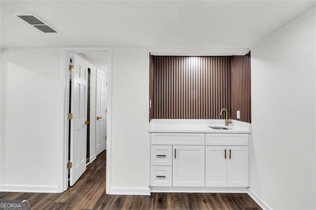 529 Greystone Trl, Marietta, GA 30068 - bathroom with a sink, wood finished floors, and baseboards