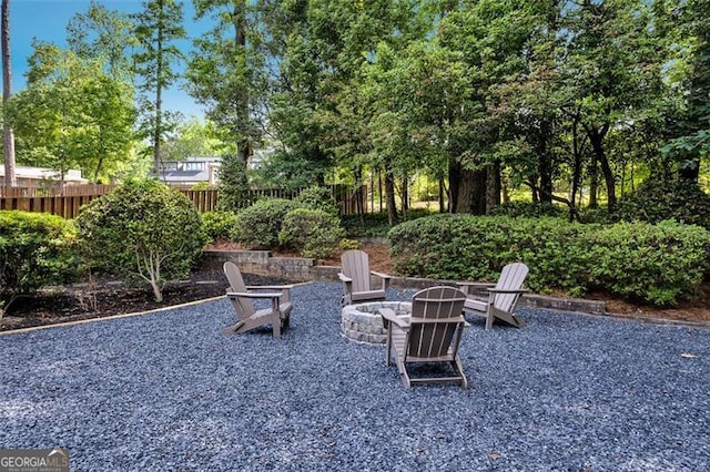 529 Greystone Trl, Marietta, GA 30068 - view of patio / terrace with fence and a fire pit