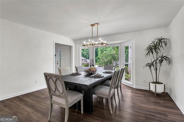 529 Greystone Trl, Marietta, GA 30068 - dining space featuring a chandelier, baseboards, and dark wood-style flooring