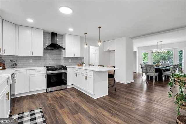 529 Greystone Trl, Marietta, GA 30068 - kitchen featuring wall chimney range hood, range with gas stovetop, backsplash, white cabinets, and light countertops