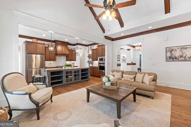 11660 Crabapple Rd, Roswell, GA 30075 - living area with vaulted ceiling, light wood-style flooring, a ceiling fan, crown molding, and recessed lighting