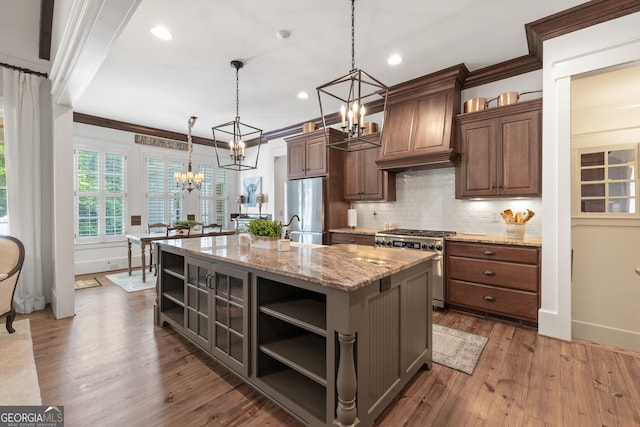 11660 Crabapple Rd, Roswell, GA 30075 - kitchen featuring stainless steel appliances, a chandelier, open shelves, decorative backsplash, and light stone counters