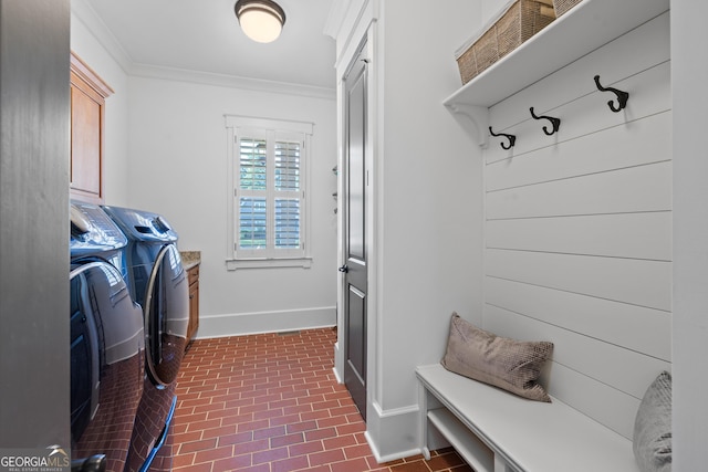 11660 Crabapple Rd, Roswell, GA 30075 - laundry area with washing machine and clothes dryer, crown molding, and cabinet space