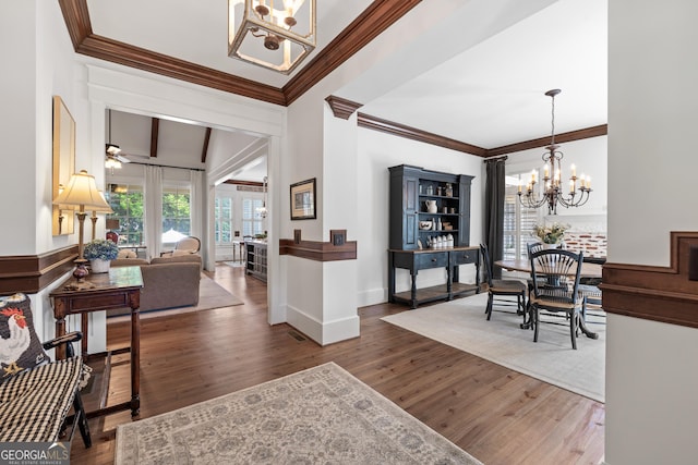11660 Crabapple Rd, Roswell, GA 30075 - entrance foyer with a chandelier, crown molding, wood finished floors, and ceiling fan