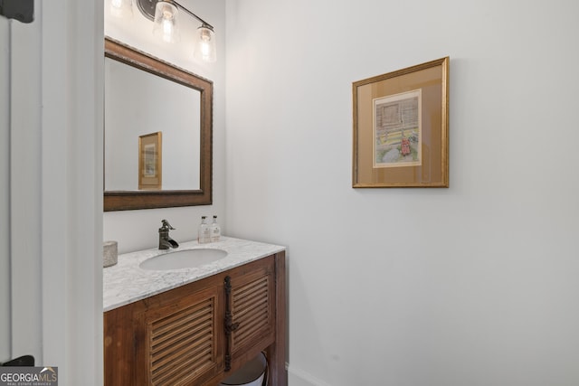 11660 Crabapple Rd, Roswell, GA 30075 - bathroom featuring vanity and baseboards