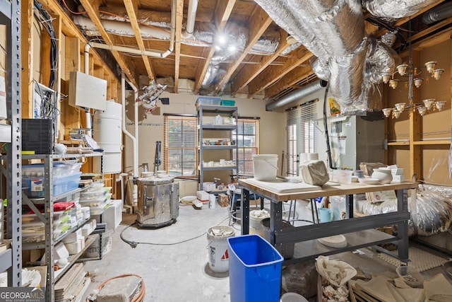 11660 Crabapple Rd, Roswell, GA 30075 - below grade area featuring a central vacuum unit and a workshop area