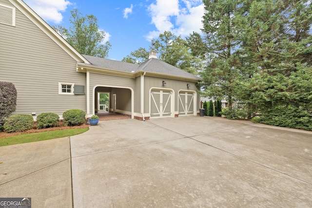 11660 Crabapple Rd, Roswell, GA 30075 - garage with driveway and cooling unit
