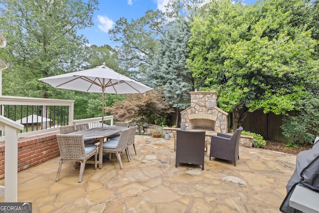 11660 Crabapple Rd, Roswell, GA 30075 - view of patio featuring an outdoor stone fireplace and outdoor dining area