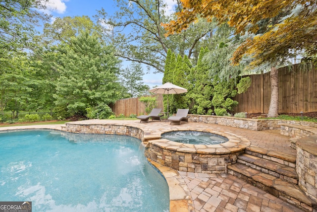 11660 Crabapple Rd, Roswell, GA 30075 - view of pool with an in-ground hot tub, a patio, and a fenced backyard