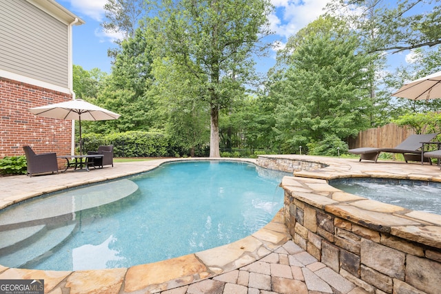 11660 Crabapple Rd, Roswell, GA 30075 - view of swimming pool with an in-ground hot tub and a patio