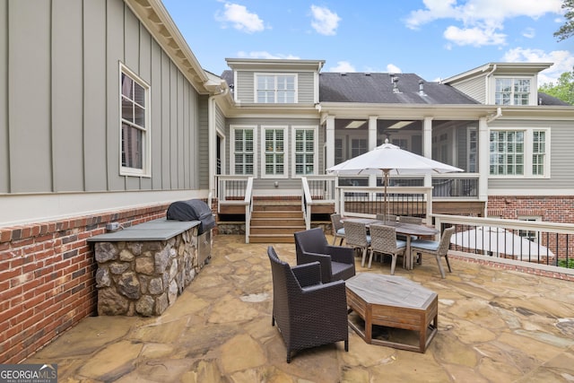 11660 Crabapple Rd, Roswell, GA 30075 - view of patio with a sunroom, outdoor dining area, a wooden deck, and grilling area