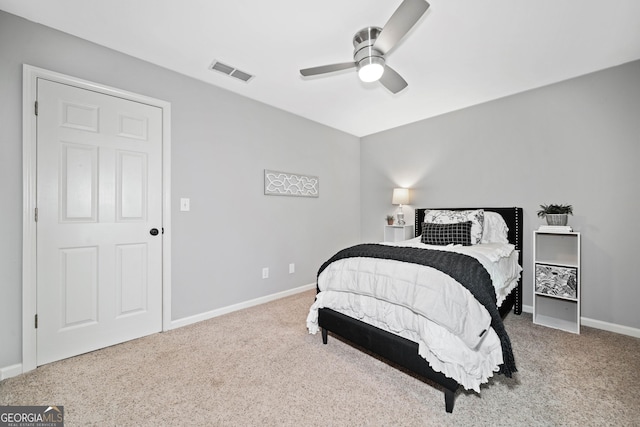 bedroom featuring carpet floors, baseboards, and ceiling fan