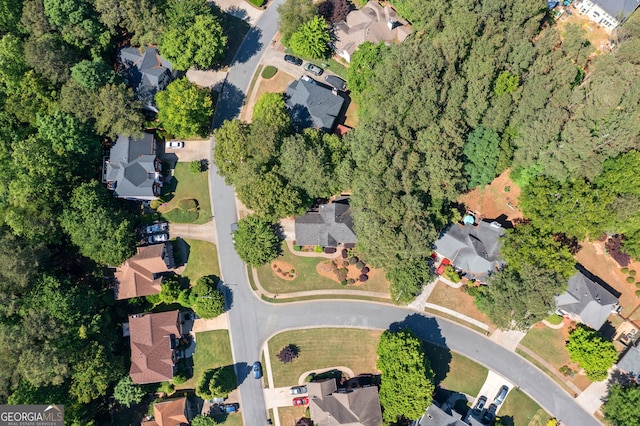 aerial view of property's location with nearby suburban area