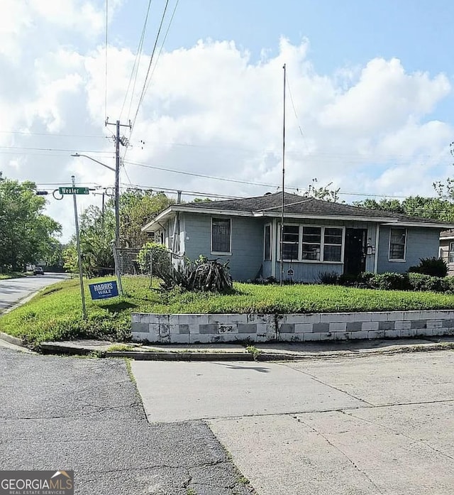 view of front of home with a front yard