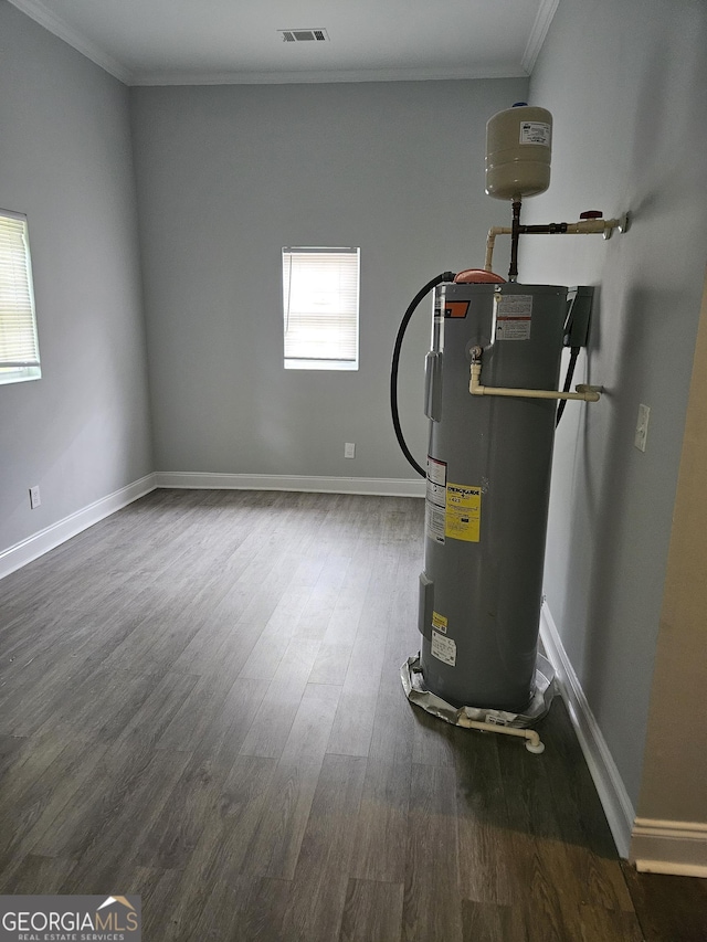 utility room featuring electric water heater