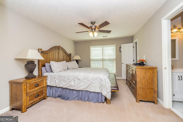 10 Queens Ct, Sharpsburg, GA 30277 - bedroom featuring light colored carpet, a ceiling fan, and ensuite bath