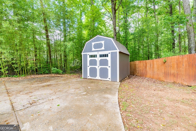 10 Queens Ct, Sharpsburg, GA 30277 - view of shed with a view of trees