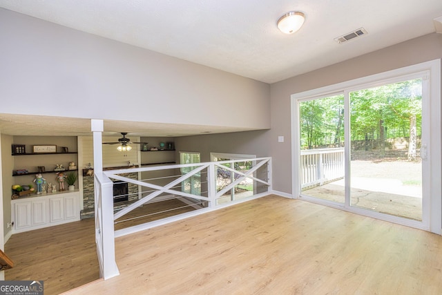 10 Queens Ct, Sharpsburg, GA 30277 - spare room featuring wood finished floors and a ceiling fan