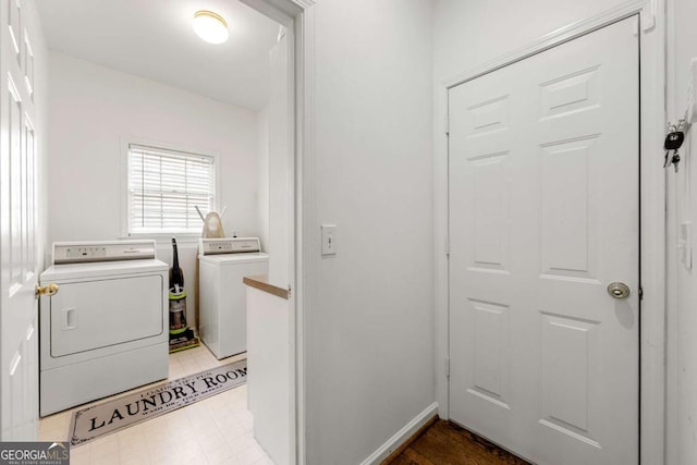 washroom with washer and clothes dryer