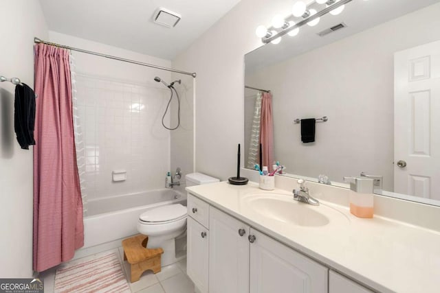 full bath with tile patterned floors, toilet, vanity, and shower / bath combination with curtain