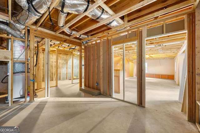misc room with concrete flooring