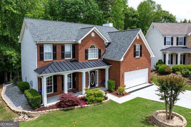 view of front facade featuring brick siding, concrete driveway, a chimney, a porch, and a shingled roof
