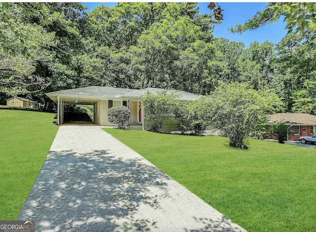 2165 Pemberton Rd, Atlanta, GA 30331 - ranch-style house featuring concrete driveway, a front yard, and a carport